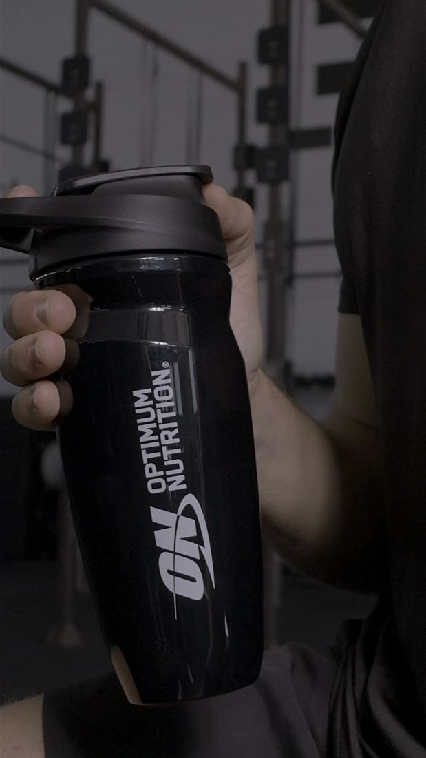 Optimum Nutrition ad. Angle: The athlete's secret weapon, held tight